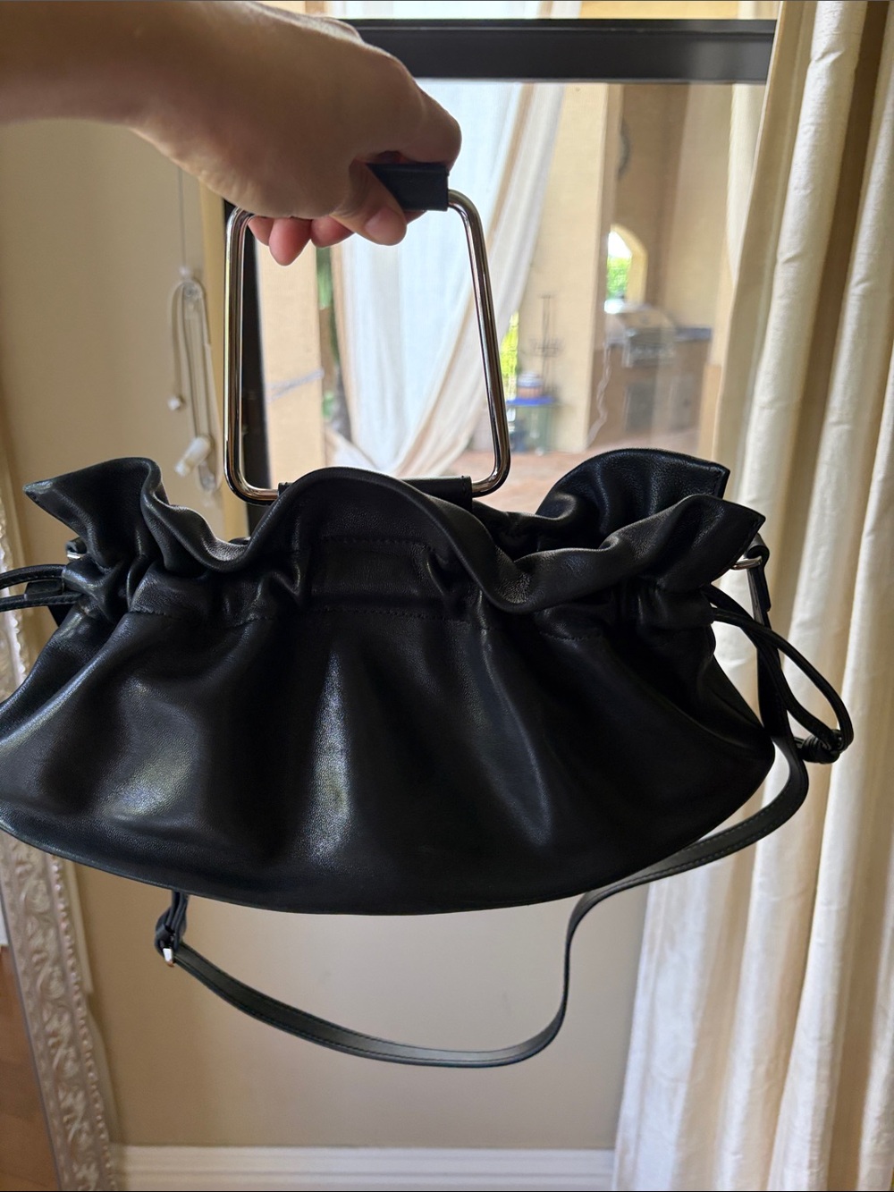Black Leather Drawstring Crossbody Bag with Metal Handle